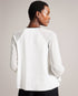 KELEIH-Tops-Channel vintage glamour with a modern twist in the KELEIH blouse. Its delicate organza ruffles and darts exude timeless elegance, while the crew neck keeps it versatile. Whether you're attending a formal event or dressing up for a date night, this blouse will effortlessly elevate your look. Blouse Organza ruffles on front Long sleeves Contrast stitching and neck tie Button fastening Darts on shoulders Crew neck with contrast binding Silvia is 5'11" / 1.8m and wears White in a Ted size 1- Ted Bak